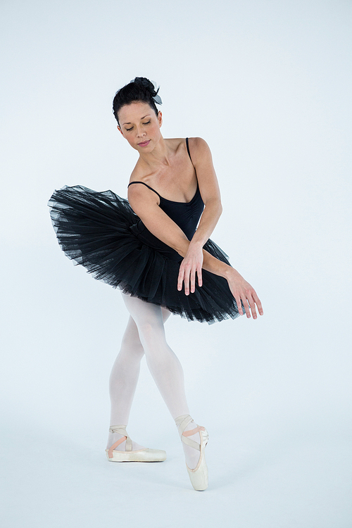 Ballerina practicing ballet dance in the studio