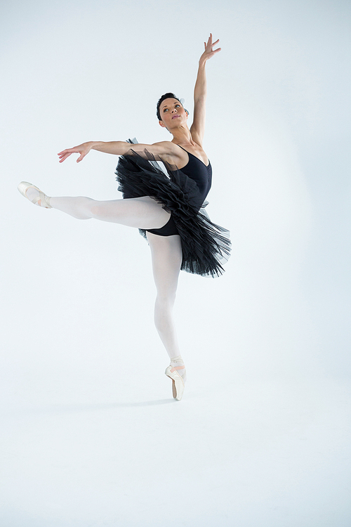 Ballerina practicing ballet dance in the studio