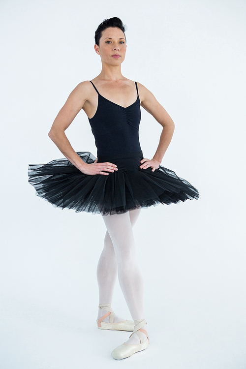 Portrait of ballerina practicing ballet dance in the studio