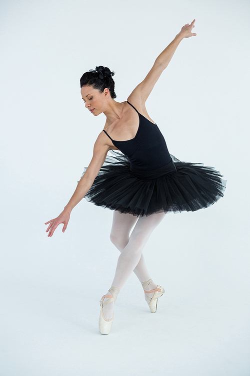 Ballerina practicing ballet dance in the studio