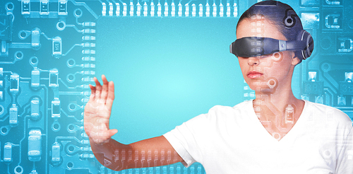 Beautiful woman gesturing while using virtual video glasses against blue electronic circuit