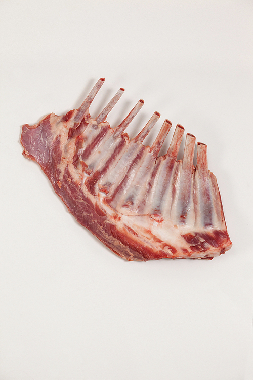 Close-up of rib rack against white background