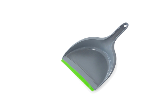 Close-up of dustpan against white background