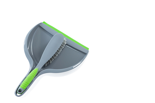 High angle view of brush with dustpan against white backgroound