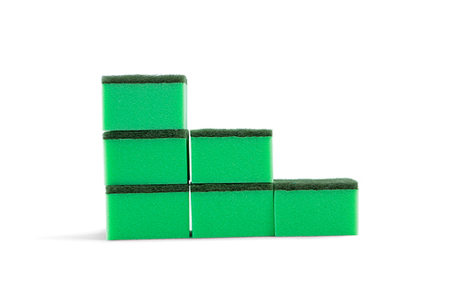 Stack of cleaning sponges against white background