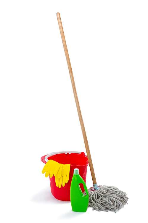 Cleaning products and mop with bucket against white background