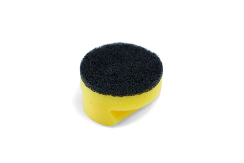 Close up of black cleaning sponge against white background