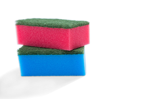 Close-up of multi colored sponge against white background