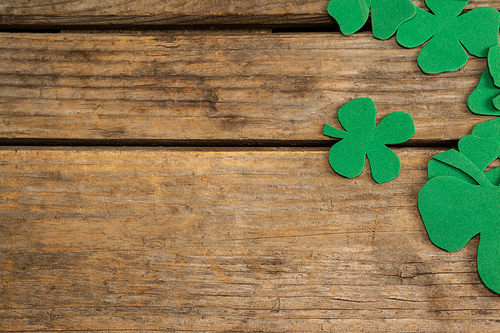 St. Patricks Day shamrocks on wooden table