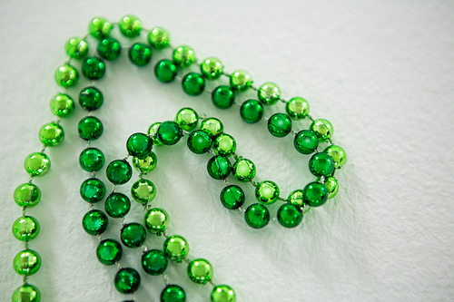 St Patricks Day close-up of beads on white background