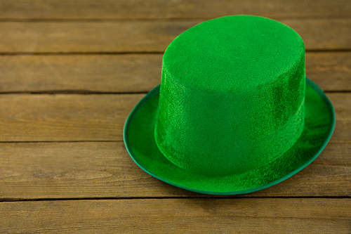 St Patricks Day leprechaun hat on wooden table