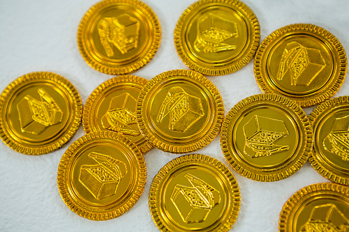 St. Patricks Day chocolate gold coins on white background
