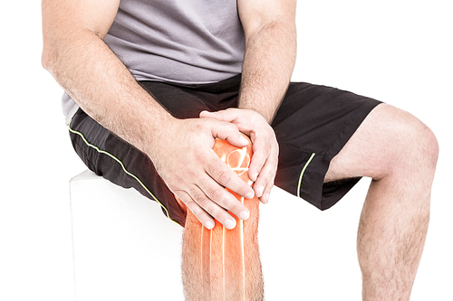 Digitally generated image of man suffering with knee inflammation against white background
