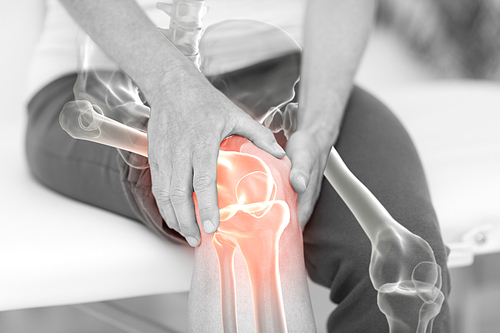 Digitally generated image of man holding sore knee