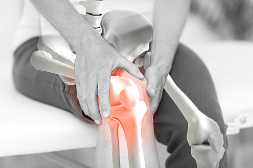 Digitally composite image of man suffering with knee inflamation