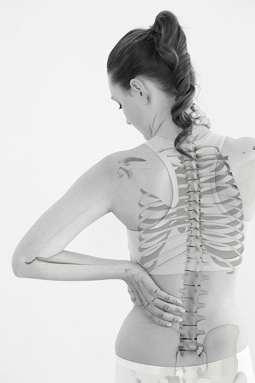 Rear view of woman suffering from muscle pain against white background
