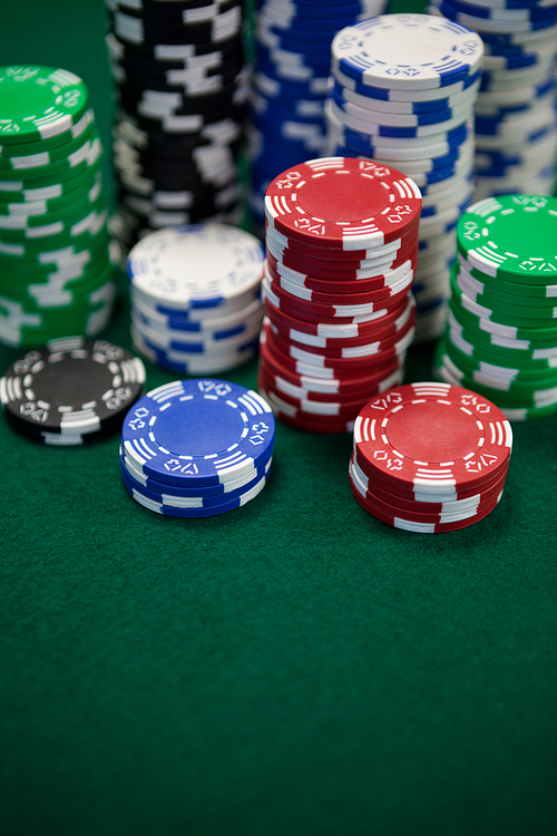 Close-up of casino chips on poker table