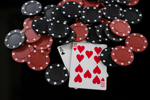 High angle view of cards and chips at casino