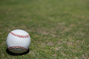 Close-up of ball on baseball field