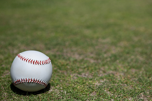 Close-up of ball on baseball field