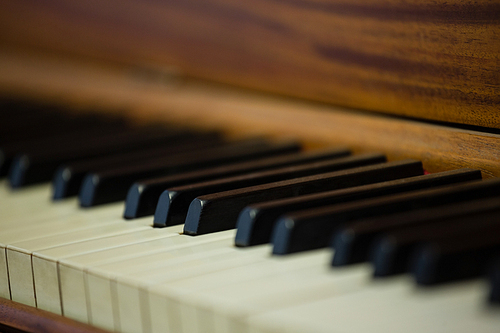 Close up of piano keys at classroom