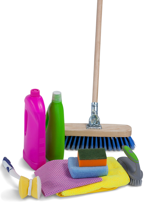 Close-up of various cleaning equipment on white background