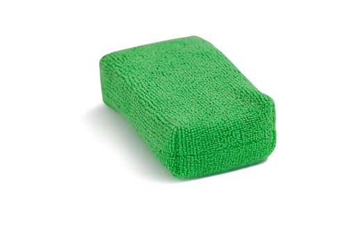 Close-up of sponge pad on white background