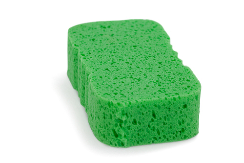 Close-up of sponge pad on white background