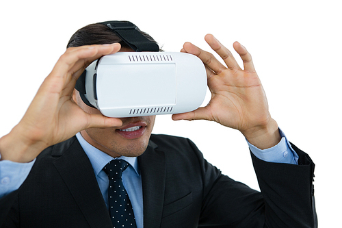 Close up of businessman wearing vr glasses against white background