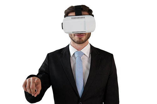 Businessman in black suit wearing vr glasses while standing against white background