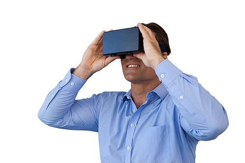 Smiling businessman in blue shirt wearing vr glasses against white background