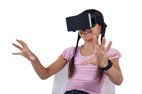 Smiling girl using virtual reality headset