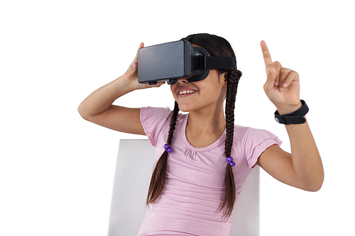 Smiling girl using virtual reality headset