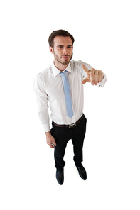 High angle view of businessman using invisible interface against white background