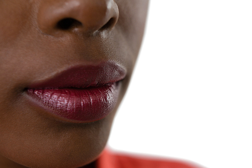 Cropped image of woman lips against white background
