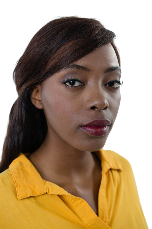 Close up of portrait of young woman with make up against white background