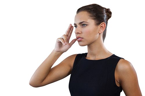 Close up of thoughtful businesswoman gesturing while looking away against white background