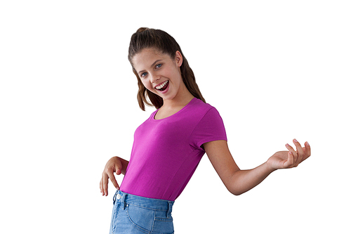Portrait of smiling girl dancing against white background