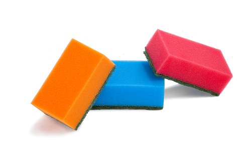 Various scouring pads arranged on white background