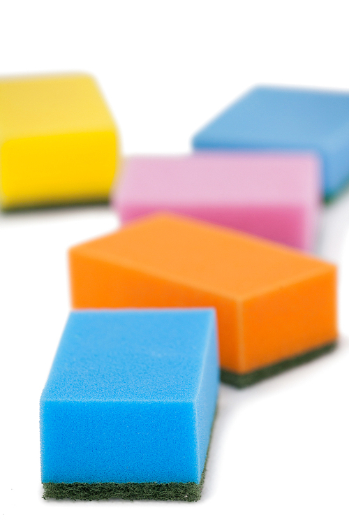 Various scouring pads on white background