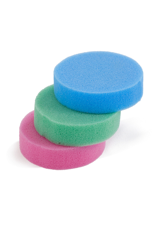 Stacked of sponge pads arranged on white background