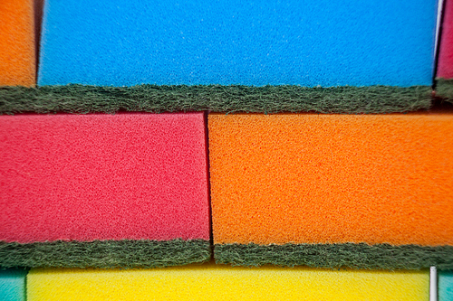 Full frame of various colorful sponge pads