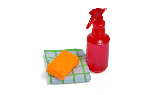 Detergent spray bottle, wipe pad and napkin cloth arranged on white background
