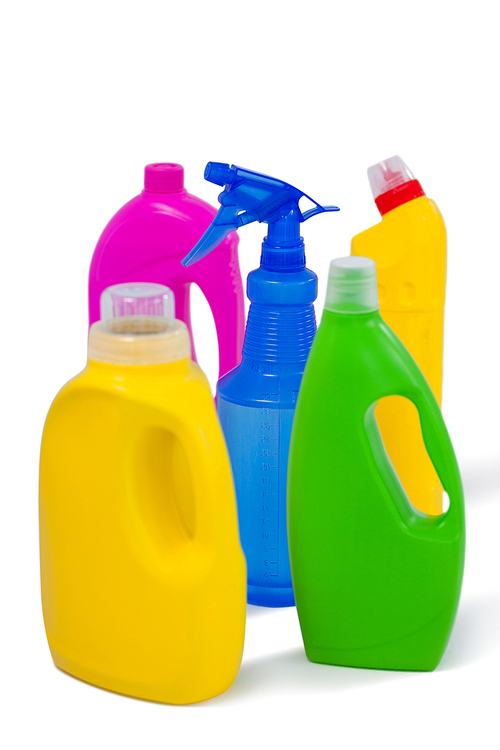 Various detergent containers and spray bottle arranged on white background
