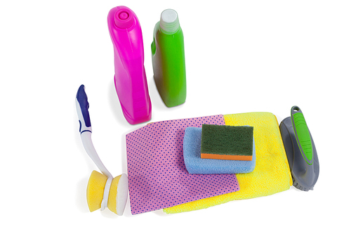 Detergent containers, scouring pad, towel, napkin cloth and cleaning brush arranged on white background