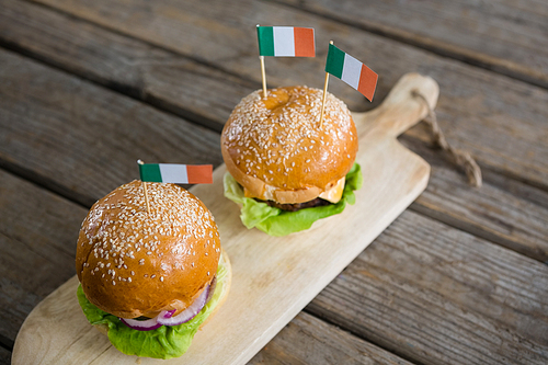 High angle view of burgers with Irish flag served on cutting board