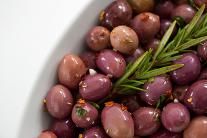 Close-up of olives garnished with rosemary