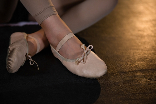 Close-up of ballerina shoes on stage