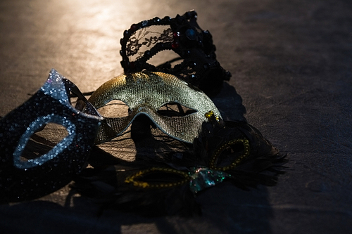 Close-up of masquerade masks on stage