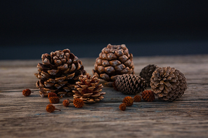 Close up of pine cones on wooden table